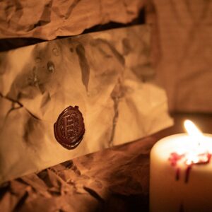 Dark vintage tarot cards and candlelight for a one question email tarot reading